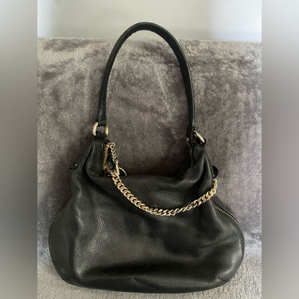 Henri Bendel- Beautiful black leather hobo-style purse. Good condition!